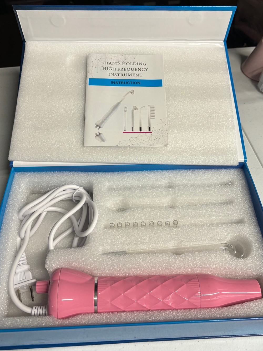 Pink High-Frequency Handheld Skin Care Device